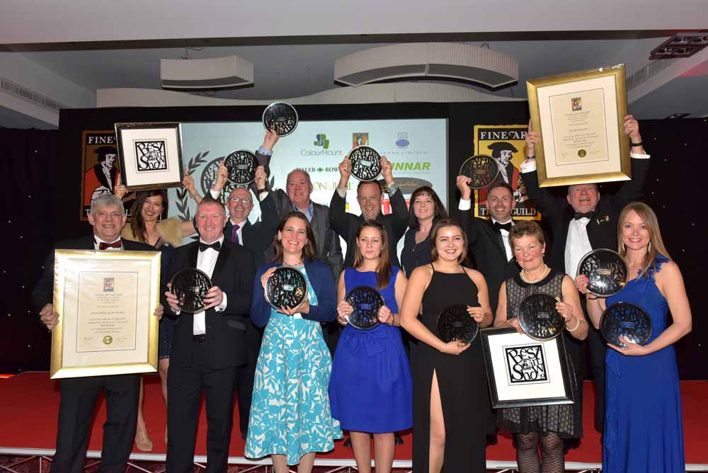 winners of the art & framing industry awards 2019 with their handmade glass plates